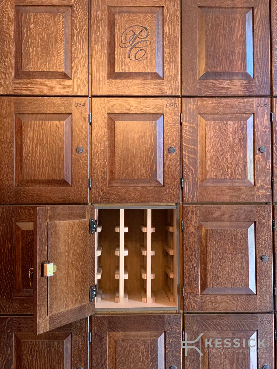 Raised-panel timber wine lockers, one door open onto a rack of bottles.